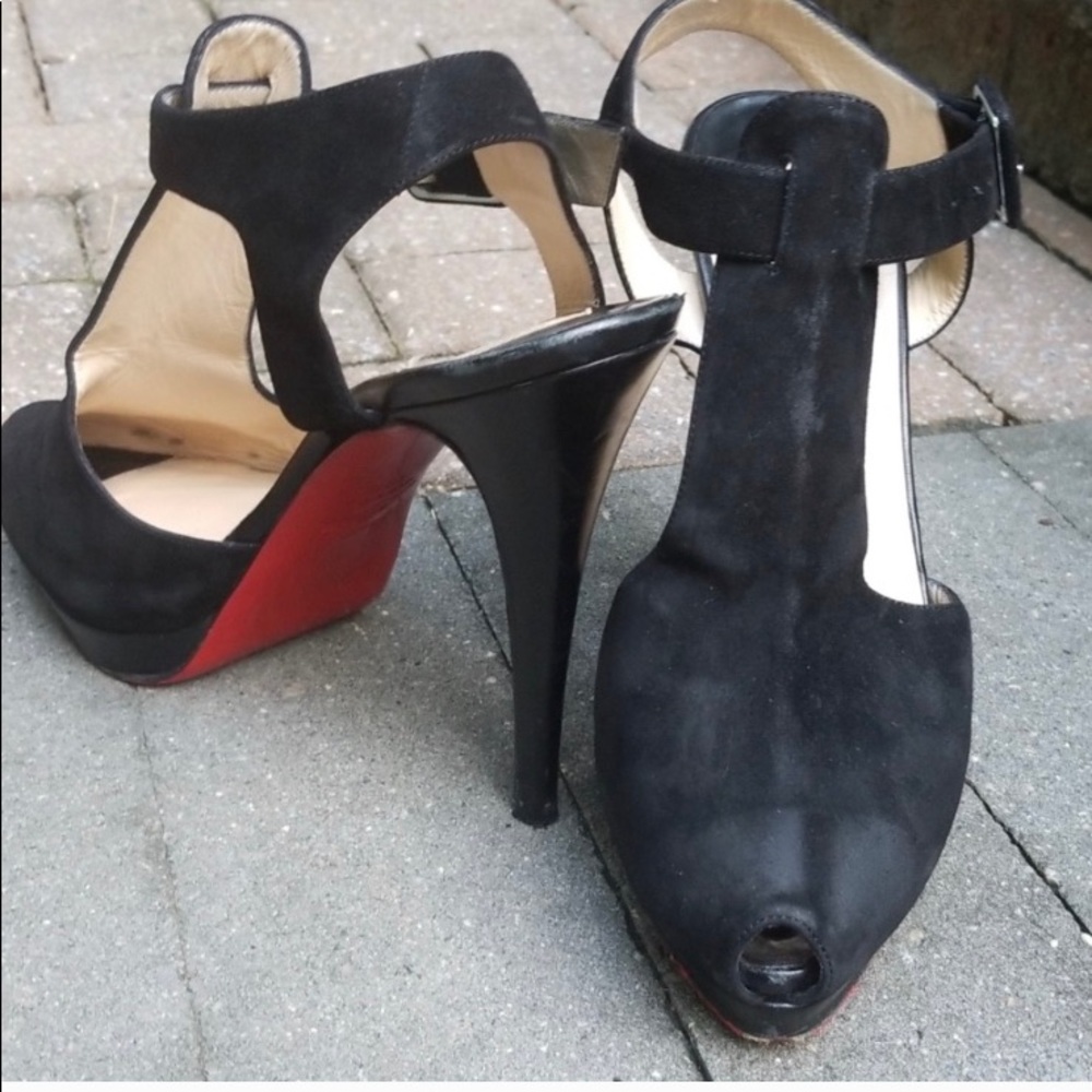 Christian Louboutin peep toe heels.